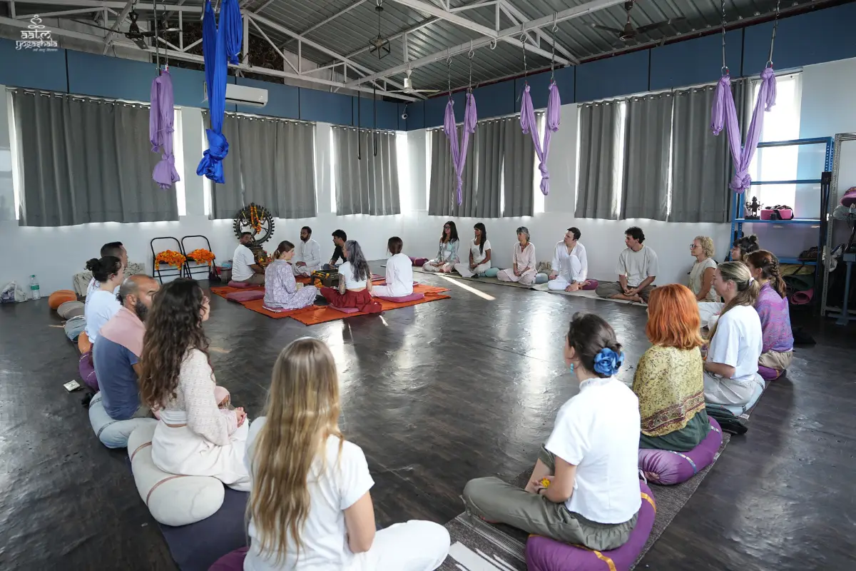 300 Hour Yoga Teacher Training students and teachers during opening satsang and meditation circle in Rishikesh