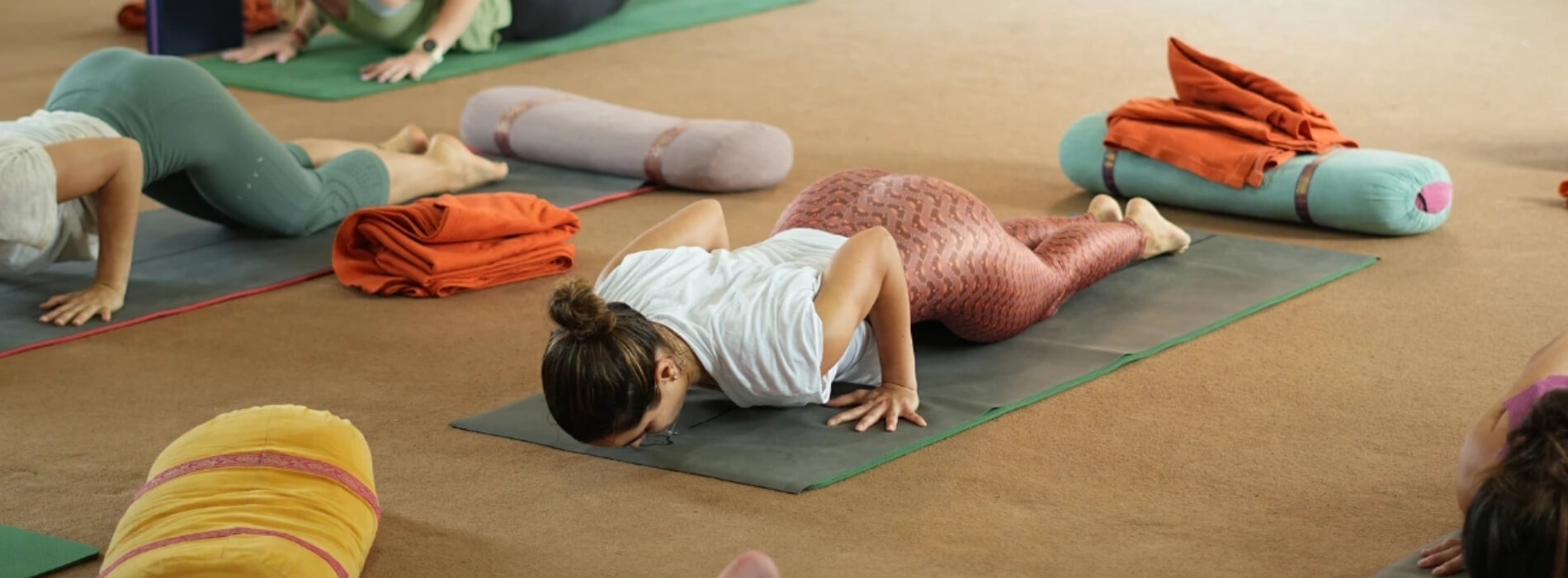 Students performing yoga asanas during 200 hour yoga teacher training course in Rishikesh