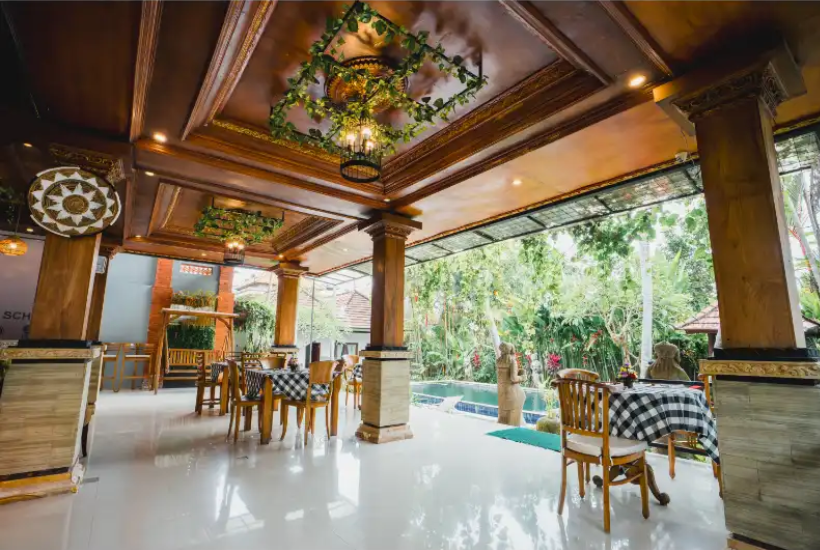 covered dining pavilion overlooking pool at Bali yoga retreat
