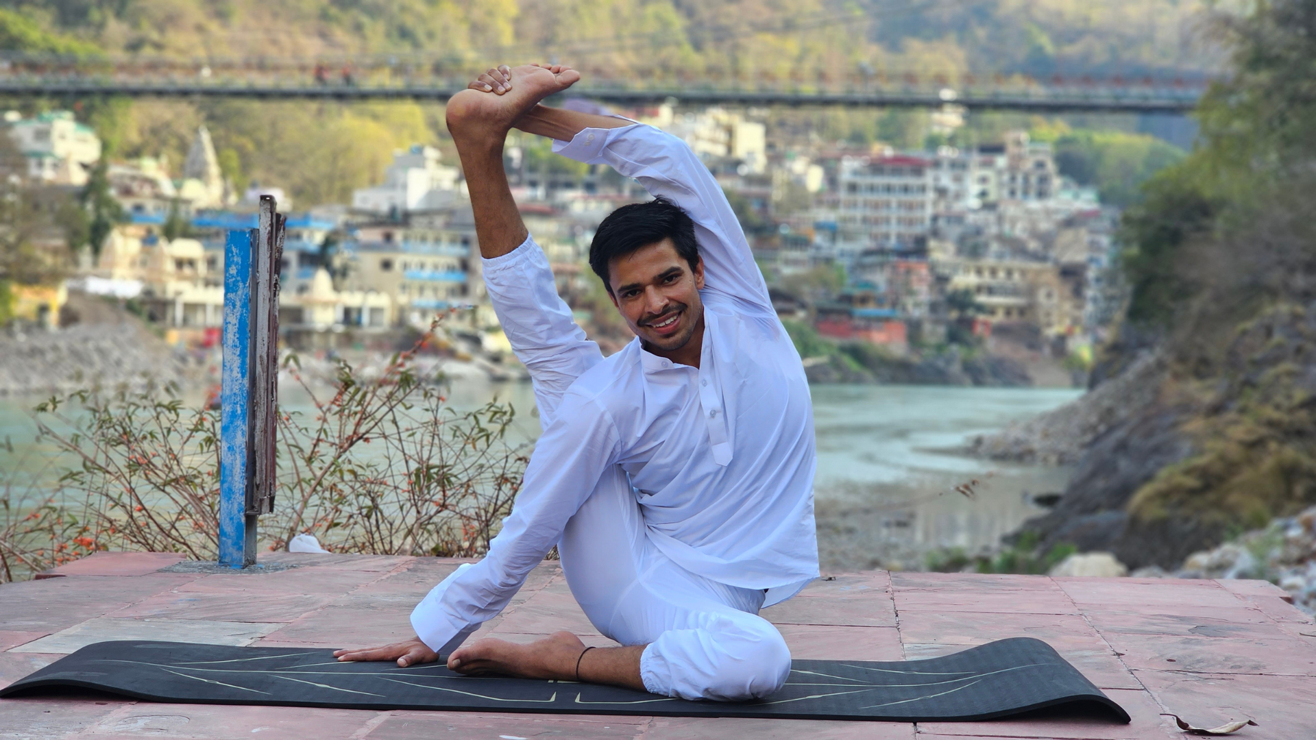 outdoor yoga by ganges river Rishikesh himalaya nature yoga session India