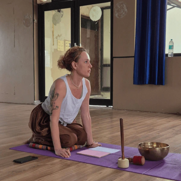 Student practicing sound healing techniques during sound therapy course in Rishikesh